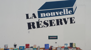 Photo du mur de l'entrée de la librairie La Nouvelle Réserve